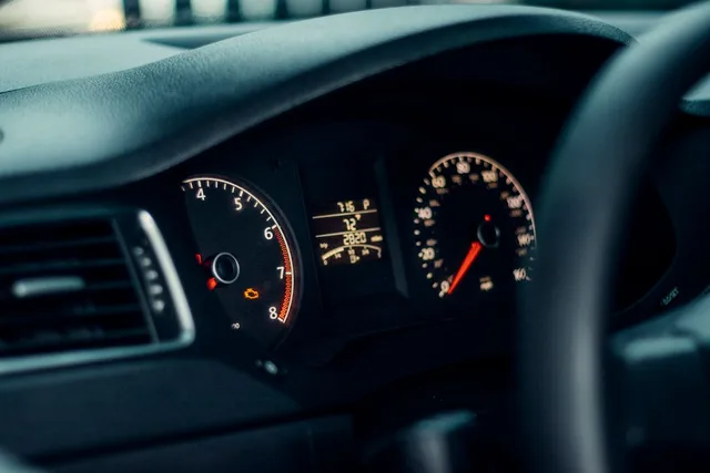 Illustrative photograph of a vehicle’s illuminated instrument panel