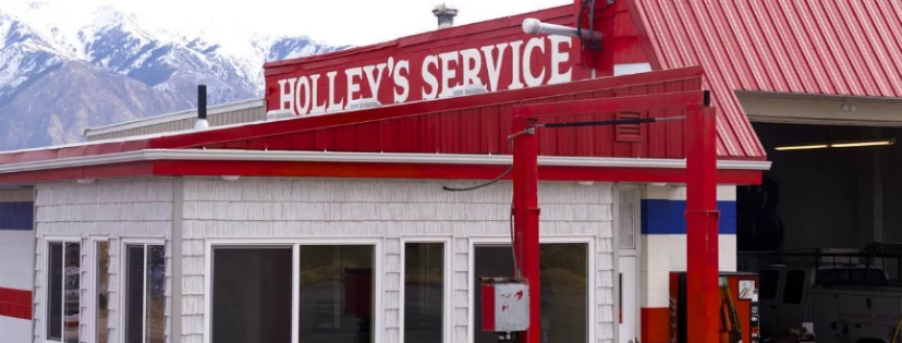 Holley’s Service in West Haven: the red-roofed shop with the mountains behind it
