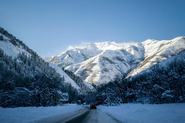 A vehicle on a snowy mountain road near Park City, Utah
